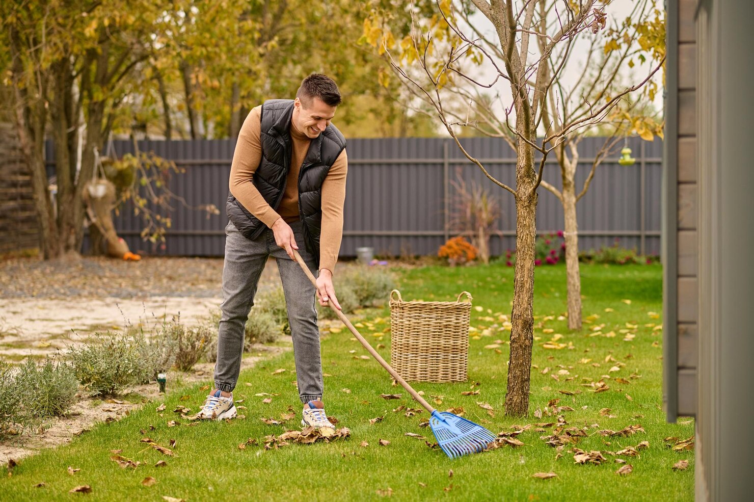joyful-man-shoveling-leaves-with-garden-tools_259150-59028 joyful-man-shoveling-leaves-with-garden-tools_259150-59028